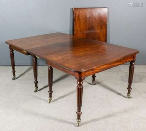 A George IV mahogany extending dining table, comprising - two D-shaped ends with rounded corners and