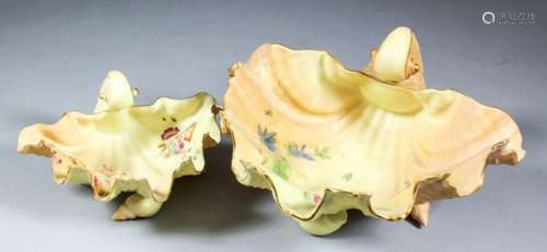 A pair of Royal Worcester blush ivory bone china silver-mounted salad bowls, moulded with shells,