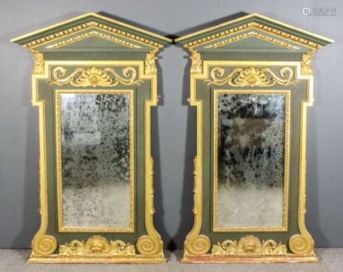 A pair of 20th Century green painted and gilt rectangular overmantel mirrors or pier glasses in