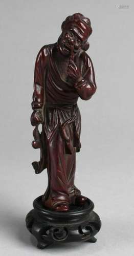 A Rosewood Carved Figurine with Stand