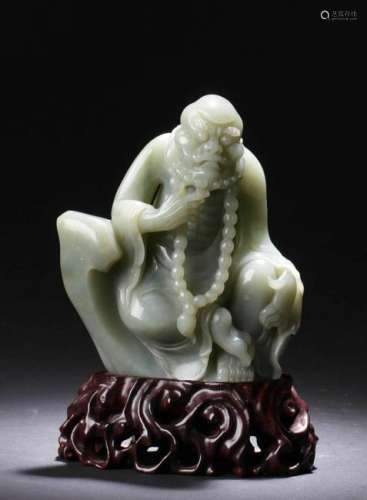 A Hotan Jade Damo Curving Statue