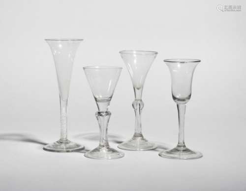 Four Continental wine glasses, 18th century, one with a rounded funnel bowl raised on a six-sided
