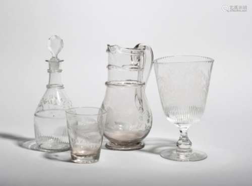 A glass decanter and stopper, c.1800, the mallet body engraved with the initials 'TMH', a jug