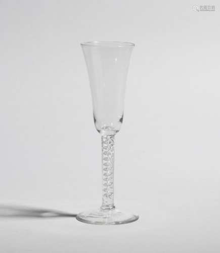 An ale glass c.1760, the slender rounded funnel bowl raised on a corkscrew mercury twist stem, 20.