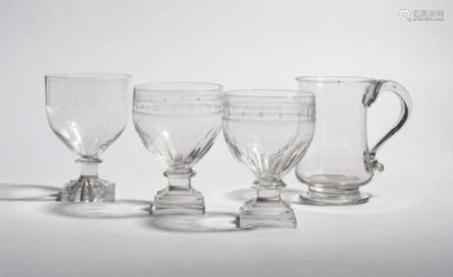 A pair of glass rummers 19th century, the generous bowls engraved with a bands of stars and polished