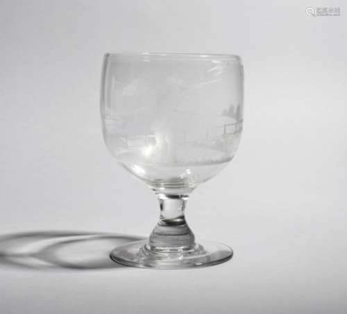 A large glass rummer 19th century, the rounded funnel bowl engraved with a man aiming a gun at