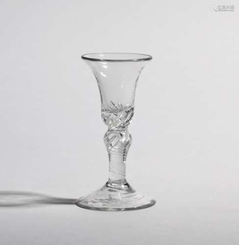A small wine or gin glass c.1760, the bell bowl rising from an airtwist stem, the twist extending to