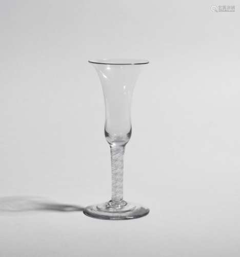 A large ale glass c.1760, with tall bell-shaped bowl raised on a double series opaque twist stem