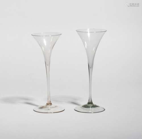 Two Dutch toasting glasses (pijpensteelglazen) 17th/18th century, of typical tall shape with drawn