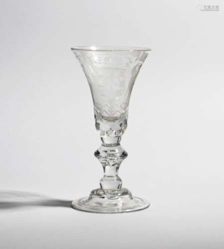 A large Dutch-engraved armorial goblet c.1760, the bell bowl engraved with a crowned shield
