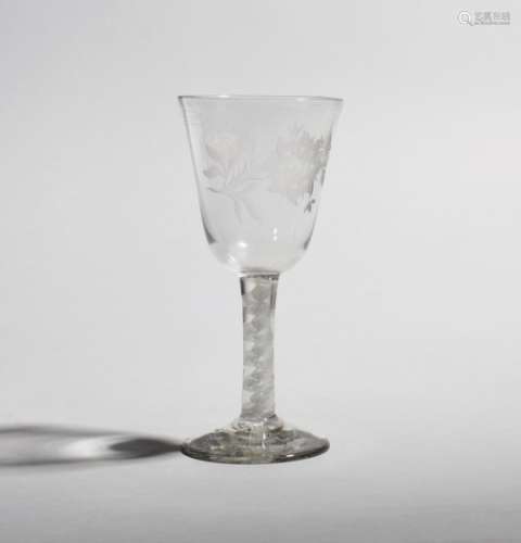 A large wine glass or goblet c.1760, the generous rounded funnel bowl engraved with a butterfly