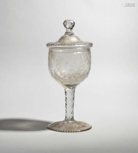 A large commemorative glass goblet and cover c.1760, the cup-shaped bowl engraved with a profile