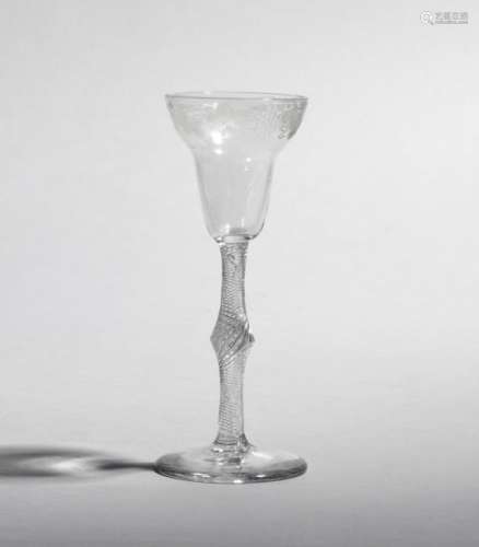 A good wine glass c.1760-70, the pan-topped bowl engraved around the rim with a continuous band of