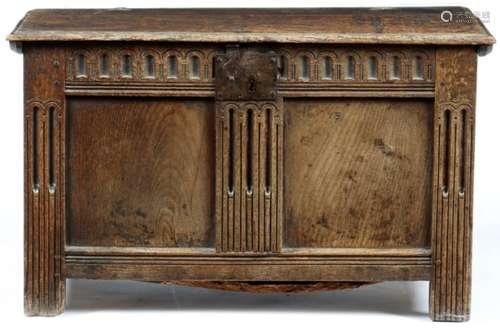 A small Charles I oak coffer, the lid with a moulded edge, the interior originally with a till,