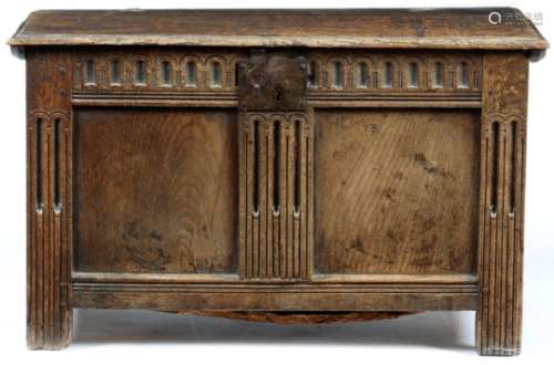 A small Charles I oak coffer, the lid with a moulded edge, the interior originally with a till,