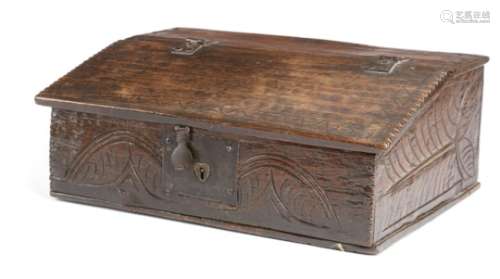 A Charles II oak desk box, the hinged fall front with crimped edges and incised zigzag decoration,