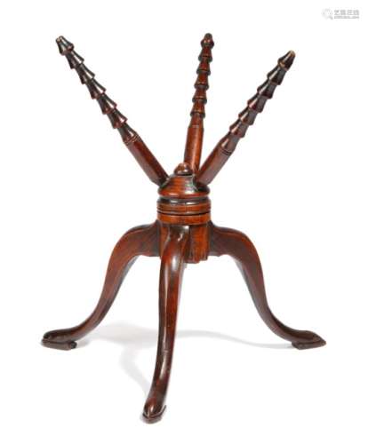 A George III turned treen cat, with three revolving ribbed spokes on a tripod base, 35cm high, 33.