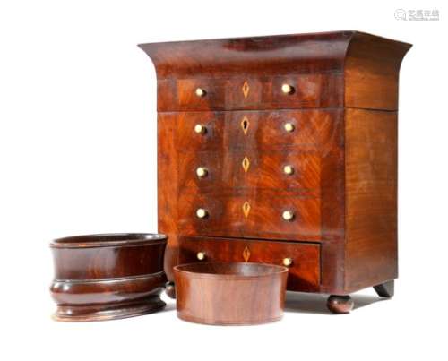 A mid-19th century continental miniature chest, the hinged top revealing a vacant lined interior,