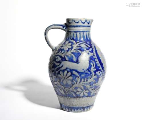 A large Westerwald jug early 19th century, with sgraffito decoration of running stags and dogs