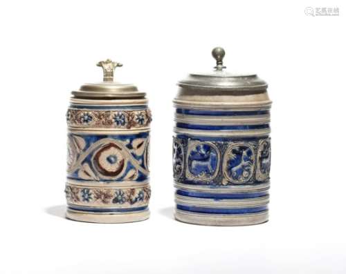 Two Westerwald stoneware tankards c.1690-1700, one applied with alternating panels of deer and