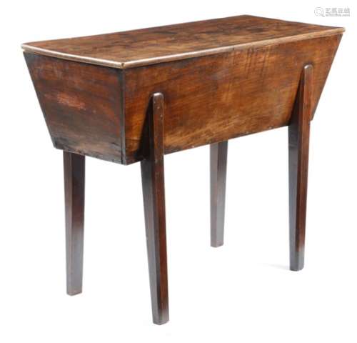 An elm dough bin, with a lift-off top, on tapering legs, late 18th / early 19th century, 86cm