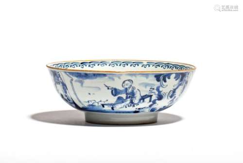 A London delftware bowl c.1760-70, painted with a Chinese figure seated on a low bench in a garden