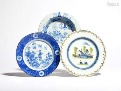 Three delftware plates c.1740-60, one London and painted in blue with a Chinese figure holding a