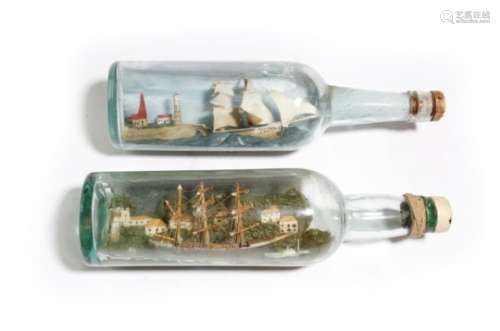 A ship in a bottle, depicting a three-masted boat with a lighthouse and a fishing village,