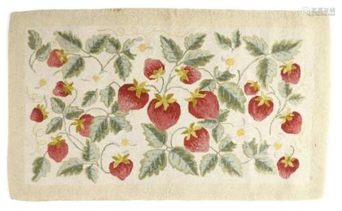 A late 19th century American hooked rug, the ivory field worked with strawberry plants, 60.5 x 101.