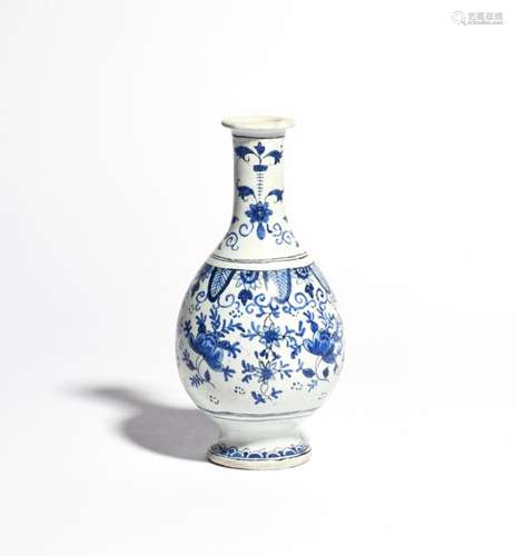 A Delft vase late 18th century, the ovoid body painted in blue and black with flowers and formal