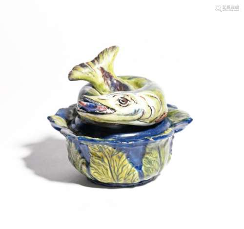 A Delft pike tureen and cover mid 18th century, the small circular bowl moulded to the exterior with