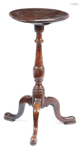 A George II oak lamp stand, the fruitwood dished circular fixed top, on a vase turned stem, on