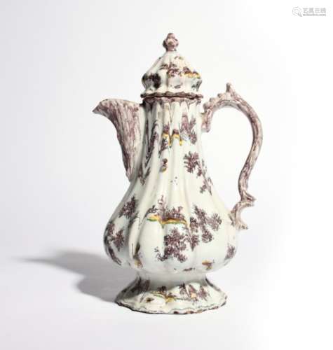 A maiolica coffee pot and cover c.1780, Pesaro or Antonibon, of elaborate fluted form, painted in