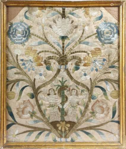 An early 18th century embroidered silkwork picture, worked with Adam and Eve flanking a serpent
