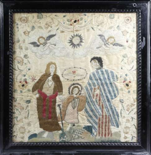 An early 18th century embroidered silkwork picture, worked with the Holy family, Joseph and Mary