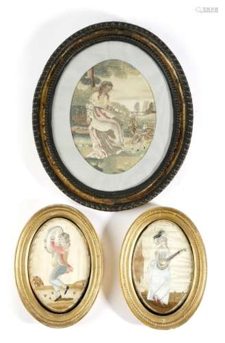 A George III silk and woolwork oval picture, depicting a shepherdess with three sheep, 22 x 16.