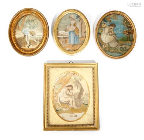 Four George III silkwork pictures, two similar depicting a lady seated with her faithful dog and