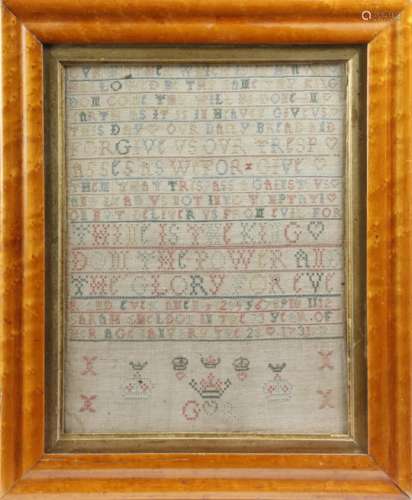 A George II needlework sampler by Sarah Sheldon, worked with the Lord's Prayer, numbers, crowns, one