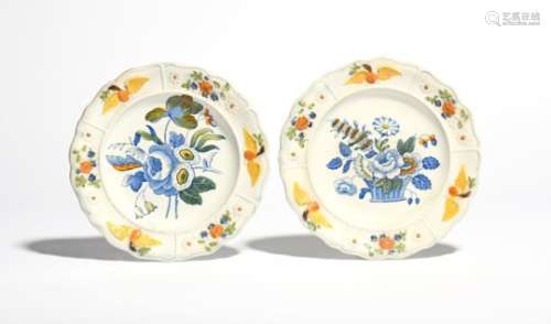 A pair of small Pratt ware plates c.1810-20, the wells printed and hand-coloured with flower