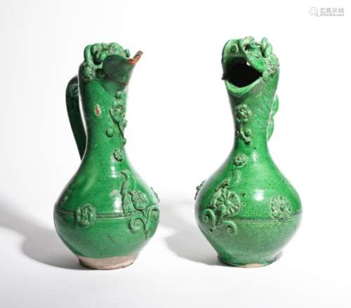 A pair of Canakkale (Turkey) pottery ewers 19th century, the rounded bodies applied with a bird