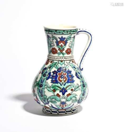 A Boch Freres Iznik-style jug late 19th/early 20th century, after an Islamic shape, decorated in a