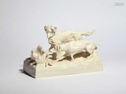 A Copeland Parian group of dogs 19th century, both in attentive poses and sniffing out a grouse or