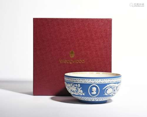 A Wedgwood Jasperware limited edition commemorative bowl 1992, applied in white on a blue ground