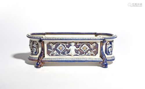 A Royal Worcester jardinière late 19th century, of low oblong form, moulded in relief with faun