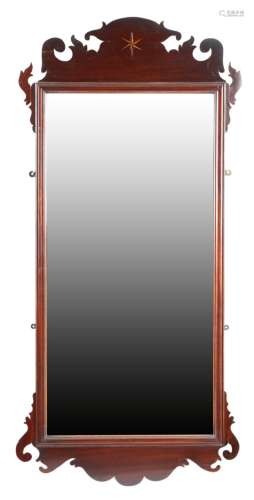A George II red walnut fret-frame wall mirror, the later rectangular plate within a moulded frame,