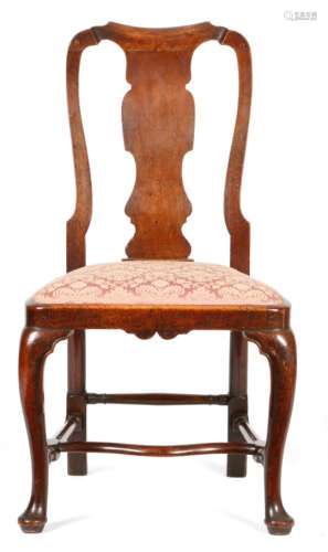 A George II red walnut side chair, the vase shaped solid splat above a later drop-in seat, on hocked