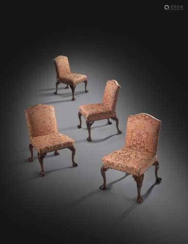A set of four George II and later walnut side chairs in the manner of William Hallett, each with