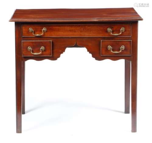 A George III mahogany lowboy, the rectangular top with a moulded edge, above three drawers and an