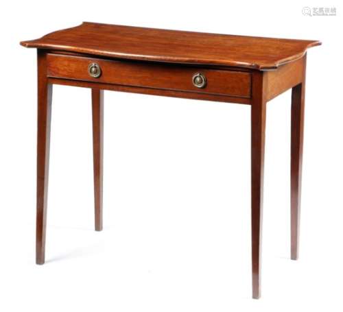 A George III mahogany side table, the serpentine top above a frieze drawer, fitted with a later