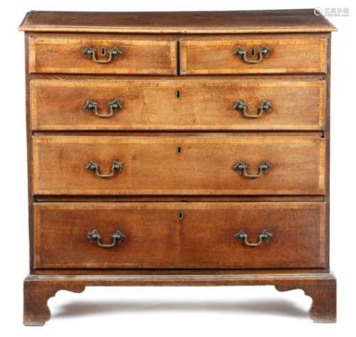 A George III oak chest, with walnut crossbanding, the moulded edge top above two short and three